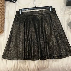 G by Guess gold & black short skirt.